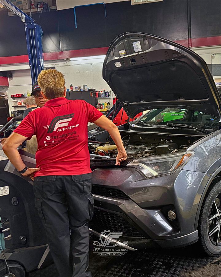 FF Family & Friends owner inspecting a customer's vehicle